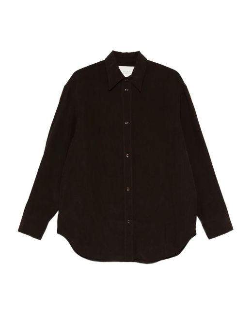 Camisa texturizada con botones Studio Nicholson de color Black