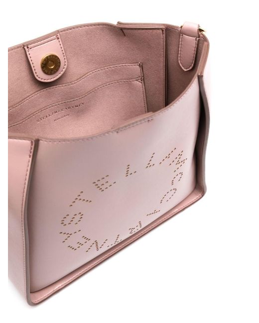 Bolso de hombro con logo perforado Stella McCartney de color Pink