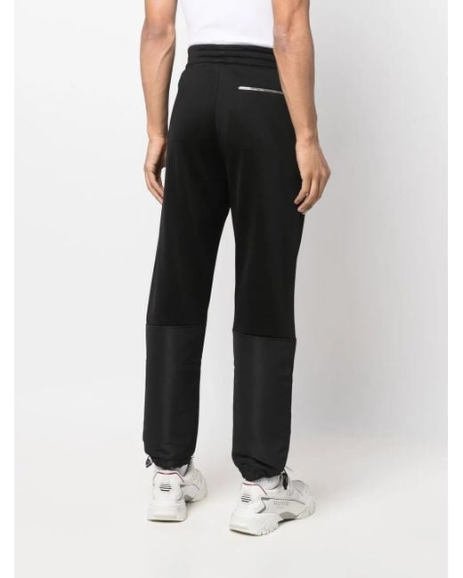 McQueen Black Panelled Tapered Track Pants for men