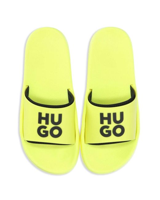 Sandali slides con logo goffrato di HUGO in Yellow da Uomo
