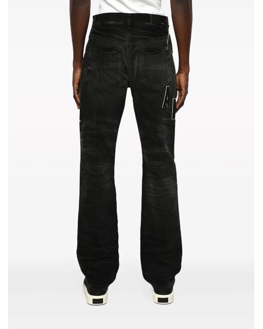Amiri Black Logo Patch Jeans for men