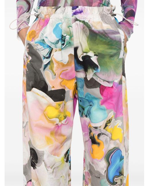 Pantalones rectos con estampado floral Stine Goya de color White