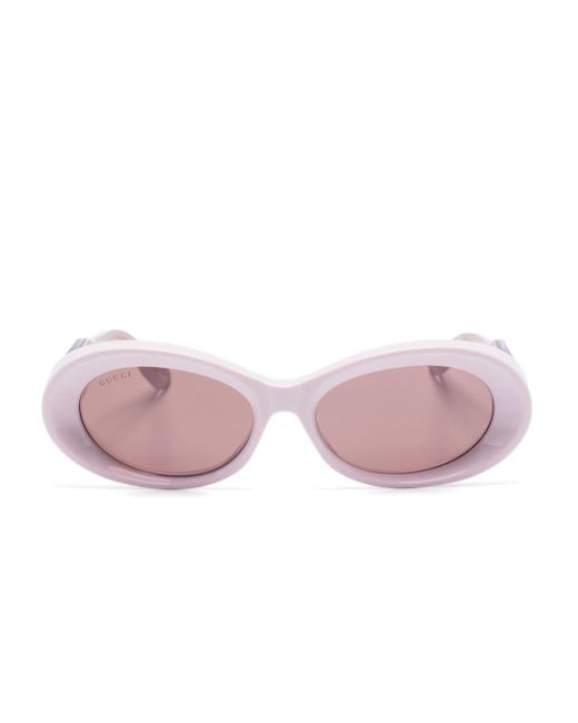 Gucci Pink Sonnenbrille mit ovalem Gestell