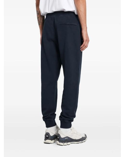 Stone Island Blue Cuffed Logo-Patch Tack Pants for men