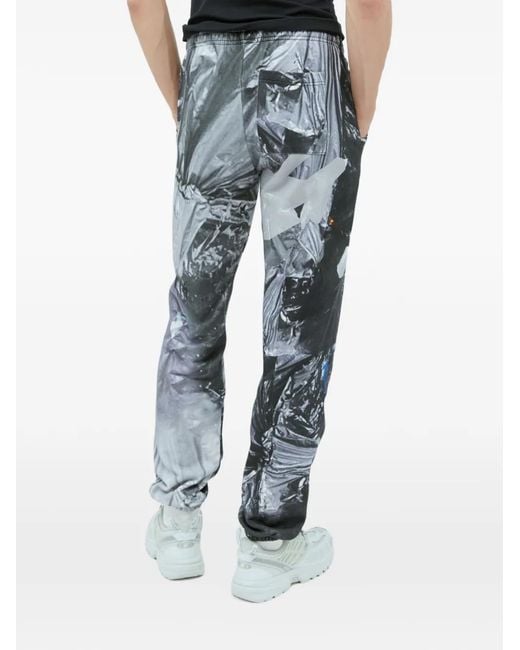 PRAYING Blue Garbage Graphic-Print Track Pants