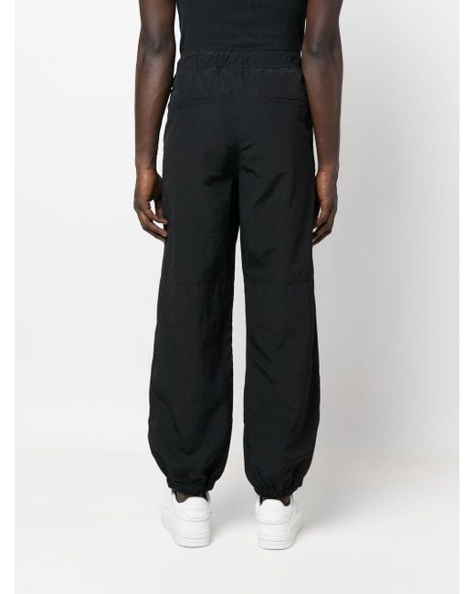 Pantalones con cierre con cordones Marcelo Burlon de hombre de color Black