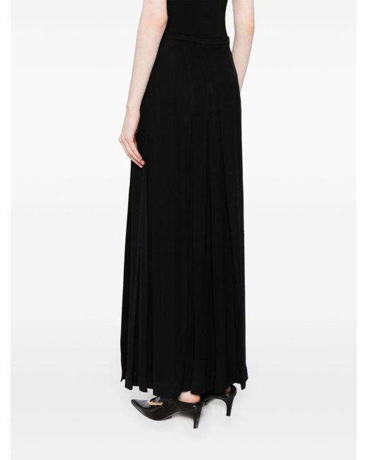 Wrap-around maxi skirt Totême  en coloris Black