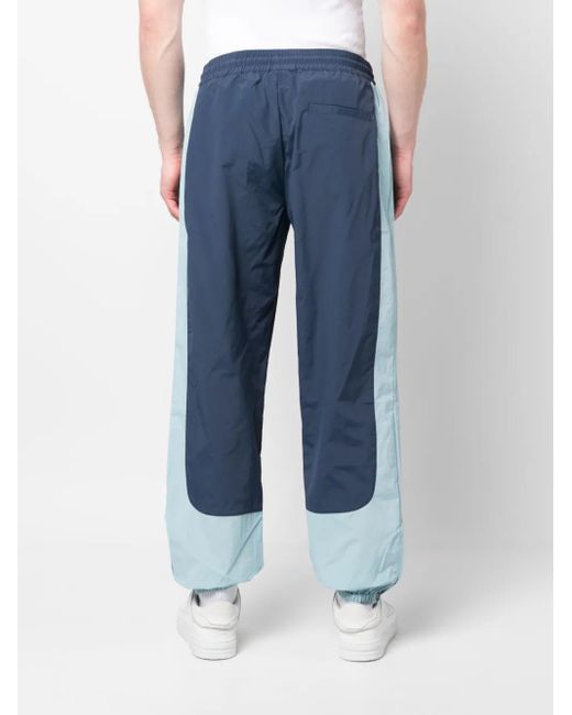 Pantalon De Jogging À Empiècements Arte' pour homme en coloris Blue