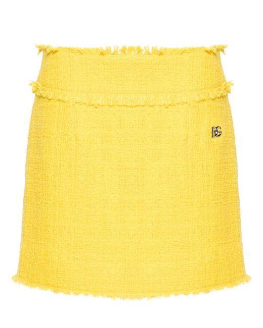 Minijupe en tweed à coupe évasée Dolce & Gabbana en coloris Yellow