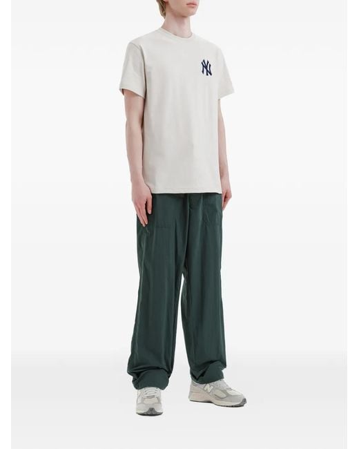 Chocoolate Green Logo-Patch Trousers for men