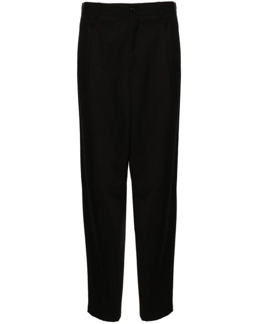 Pantaloni affusolati con pieghe di Giorgio Armani in Black da Uomo