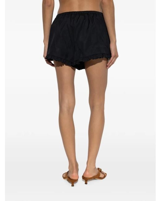 Hunza G Black Frill Mini Shorts
