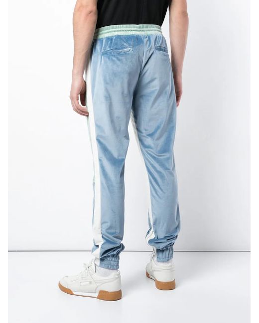 God's Masterful Children Blue Velvet Tapered Trousers for men