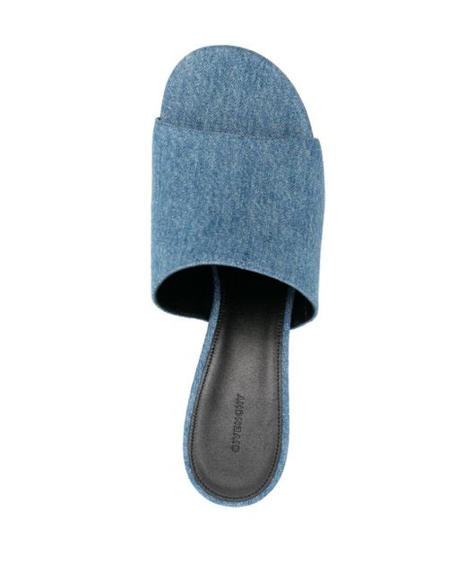 Mules en jean 90 mm à plaque logo Givenchy en coloris Blue