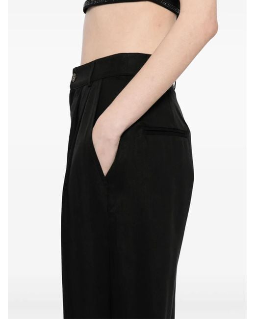 Pantalones Mason Reformation de color Black