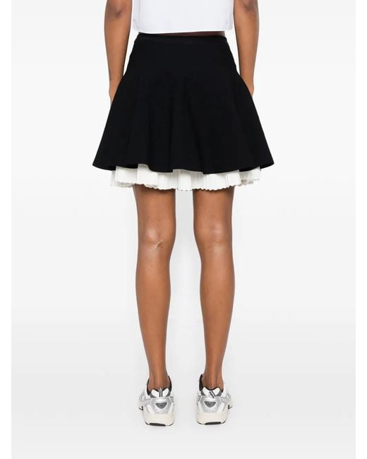Sandro Black Pleated-Hem Knitted Mini Skirt