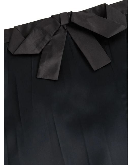 Falda midi con detalle de lazo Valentino Garavani de color Black