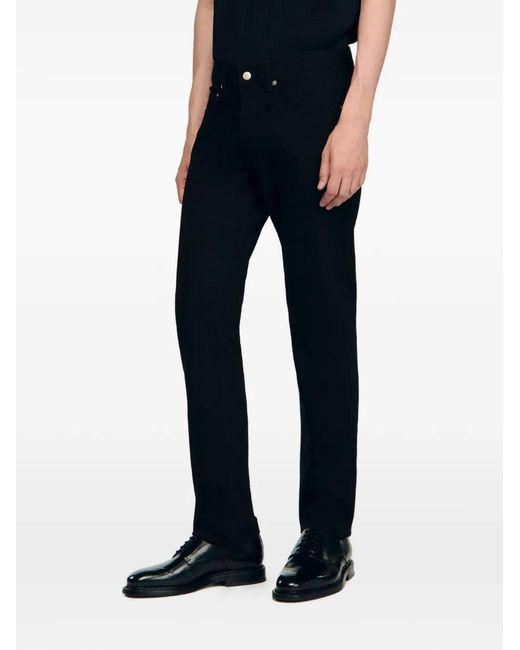 Vaqueros Skinny Con Trabillas Sandro de hombre de color Black