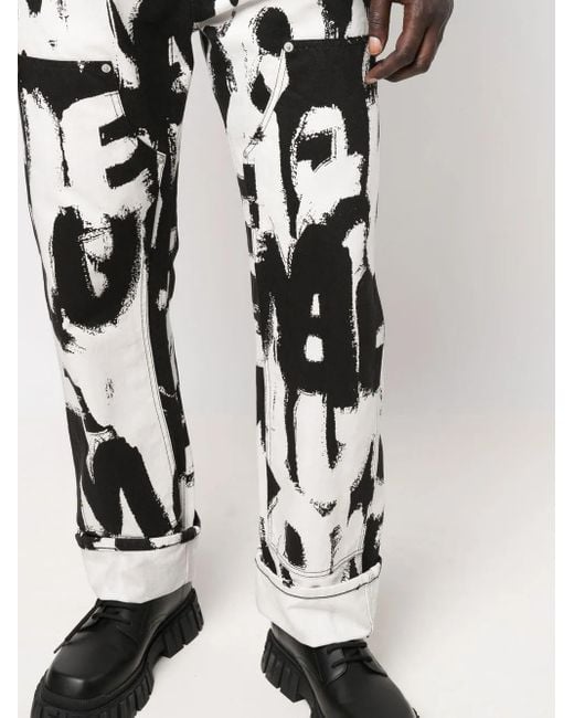 McQueen Black Graffiti-Print Straight-Leg Jeans for men