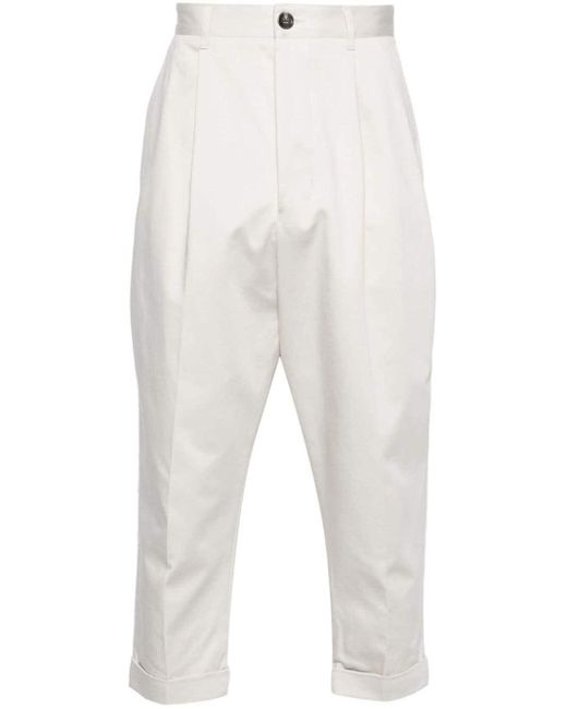 Pantalon en coton à coupe fuselée AMI pour homme en coloris White