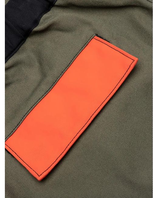 Ambush Red Panelled Cargo Trousers for men