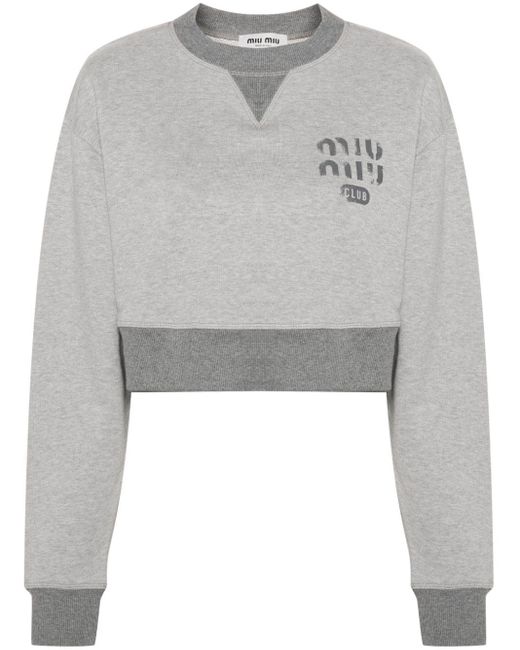 Sweat crop à logo imprimé Miu Miu en coloris Gray