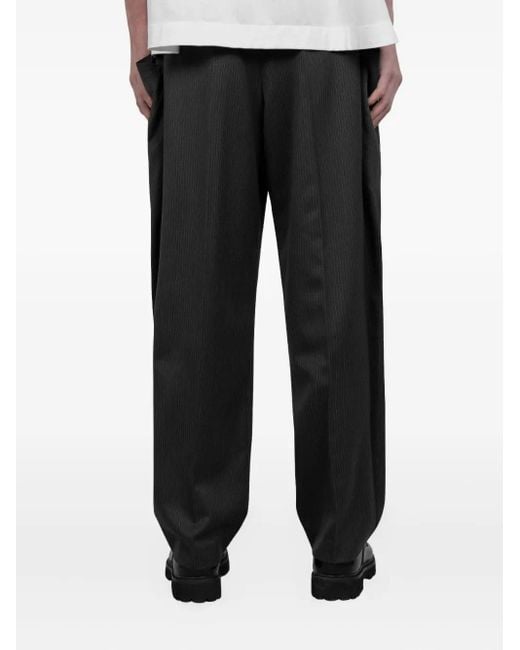 Sacai Black Pinstripe Wool Trousers for men