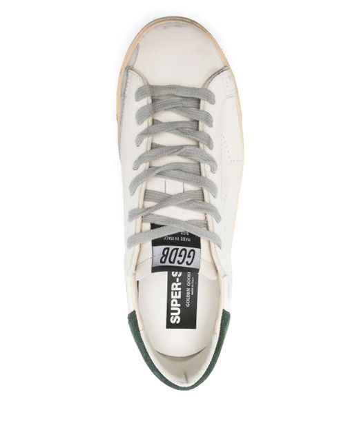 Golden Goose Deluxe Brand White Low-Top Distressed Leather Sneakers With Suede Heel Tab for men