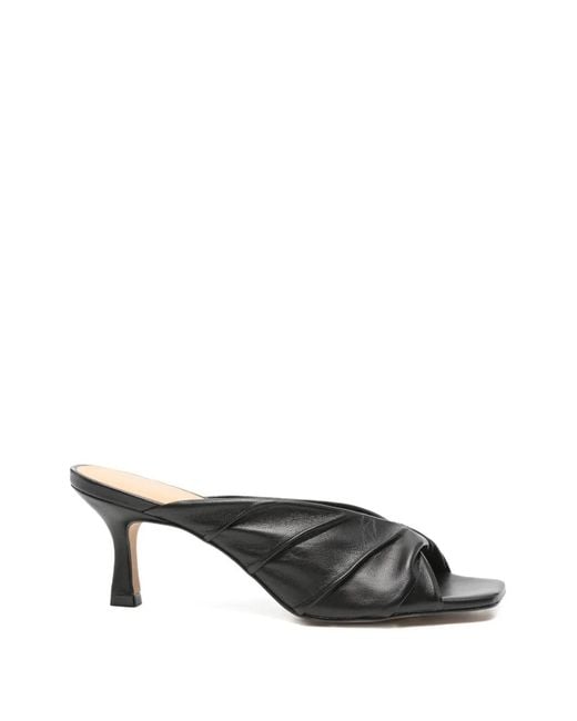 Carrano Black Mules Mit Riemen