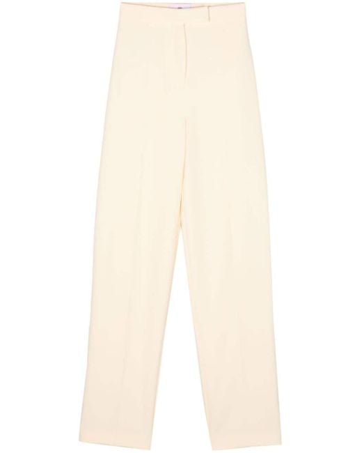 Pantalones ajustados con pinzas Chiara Ferragni de color Natural