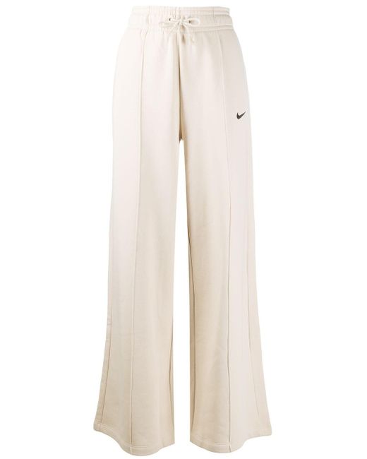 Nike Swoosh Logo Flared Trousers in Natural | Lyst Australia