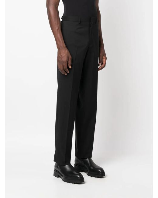 Prada Black Triangle-Logo Trousers for men