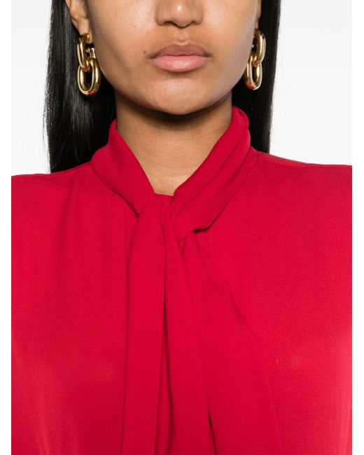 Blusa de seda con lazo Moschino de color Red