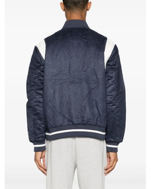 PUMA Blue X Staple Logo-Patch Varsity Jacket for men