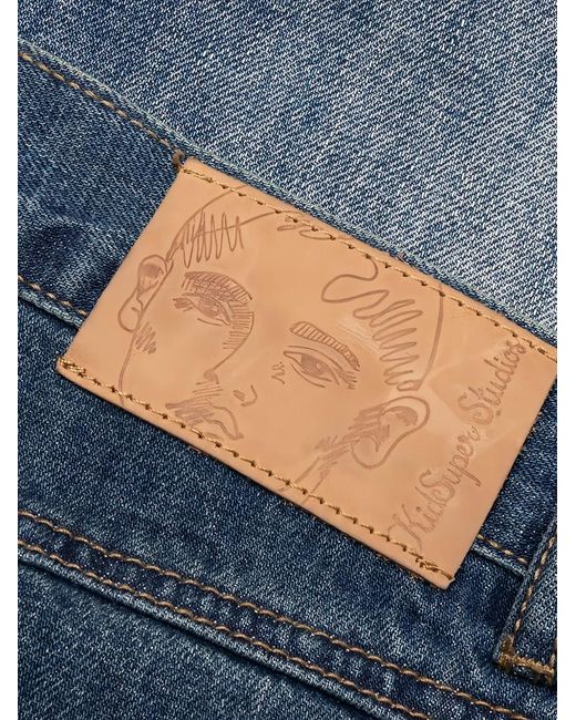 Kidsuper Blue Washed-Effect Dove-Detail Jeans for men