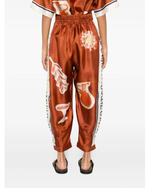 ALÉMAIS Orange Soleil D'Amour Print Trousers