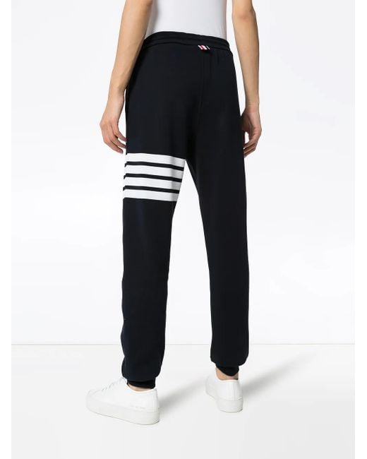 Pantalones de chándal con detalle de rayas Thom Browne de hombre de color Blue