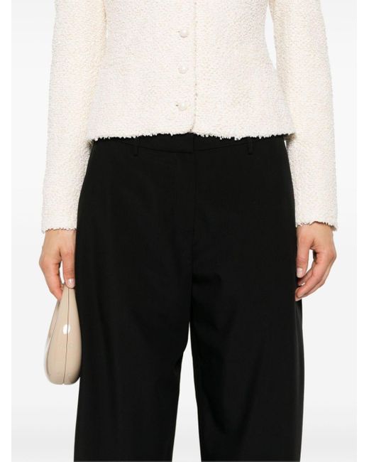 Wide-leg wool trousers Magda Butrym de color Black