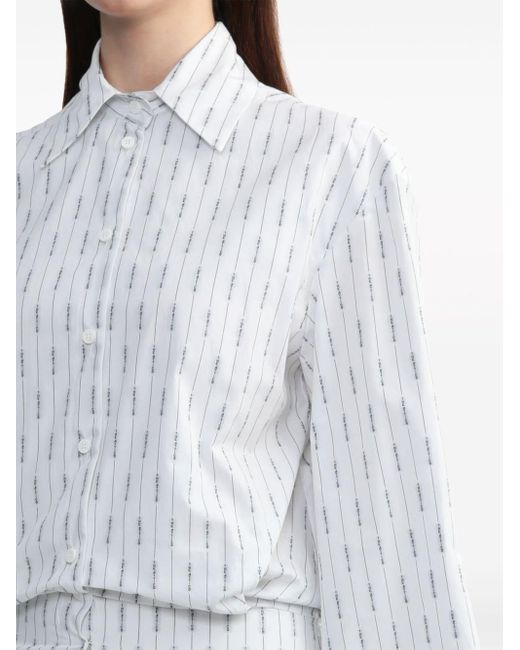 Robe-chemise en coton à fines rayures The Attico en coloris White