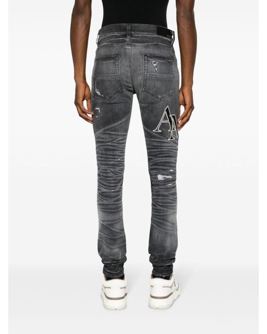 Amiri Gray staggered Skinny Jeans for men