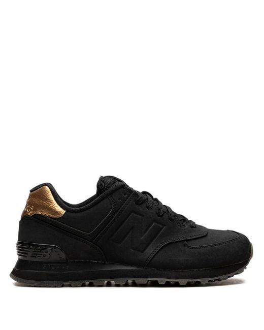 New Balance 574 "black/gold" Sneakers Lyst