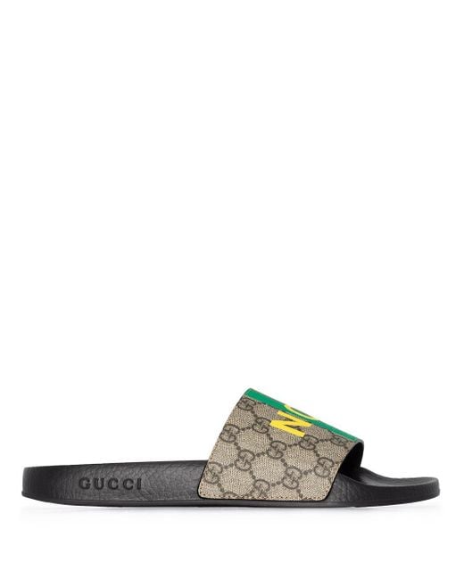 Ciabatte Fake/Not con stampa di Gucci in Marrone | Lyst