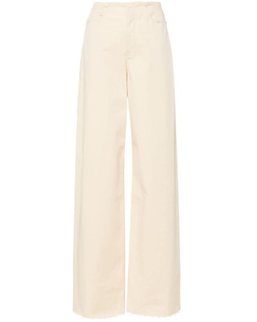 Pantaloni a gamba ampia con effetto vissuto di MM6 by Maison Martin Margiela in White