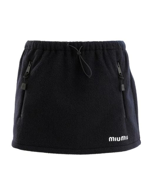 Falda con cremallera y cordones Miu Miu de color Black