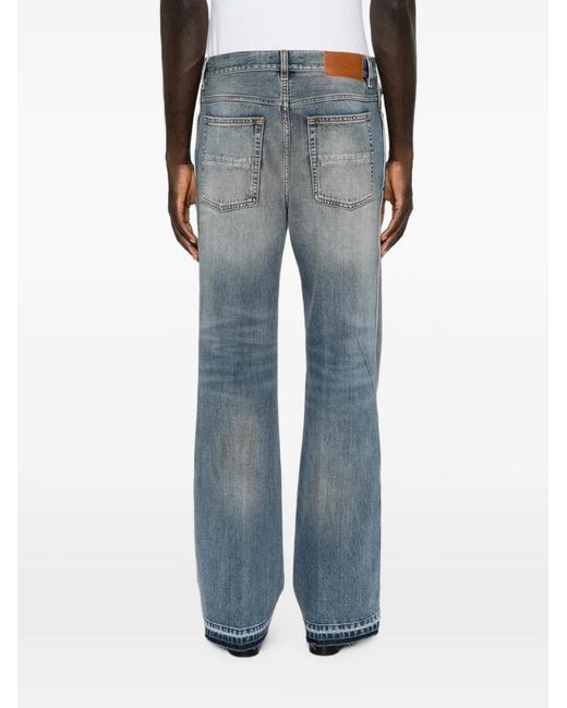 Amiri Blue Faded-Effect Bootcut Jeans for men