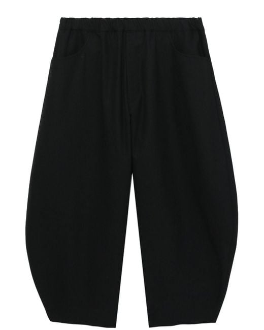 Pantalon sarouel à coupe courte COMME DES GARÇON BLACK en coloris Blue