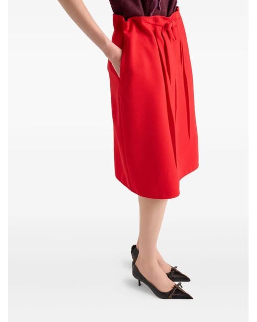 Jupe Mi-Longue Plissée À Détail De Nœud Prada en coloris Red