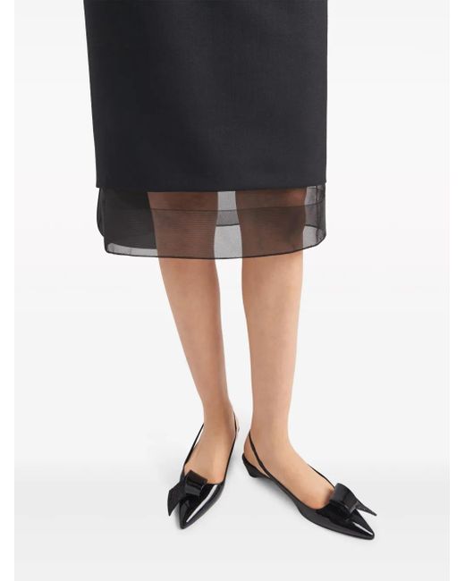 Falda a capas con logo triangular Prada de color Black