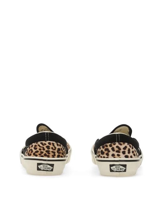 Vans White Classic Slip-On Sneakers
