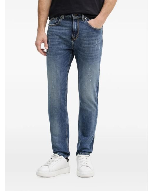 Karl Lagerfeld Blue Distressed Logo-Patch Jeans for men